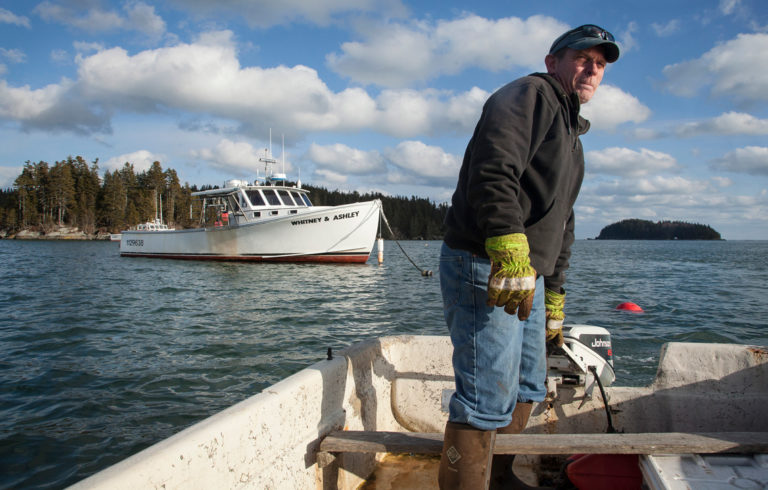 Kristan Porter heads out to one of his two boats.