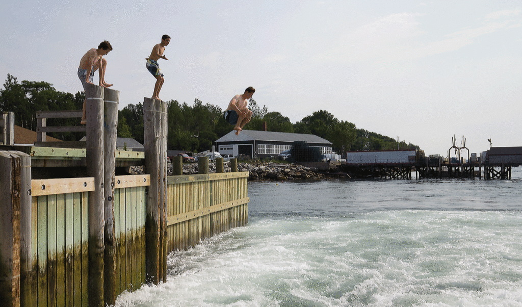 Dock jumping is a favorite summer activity on Long Island.