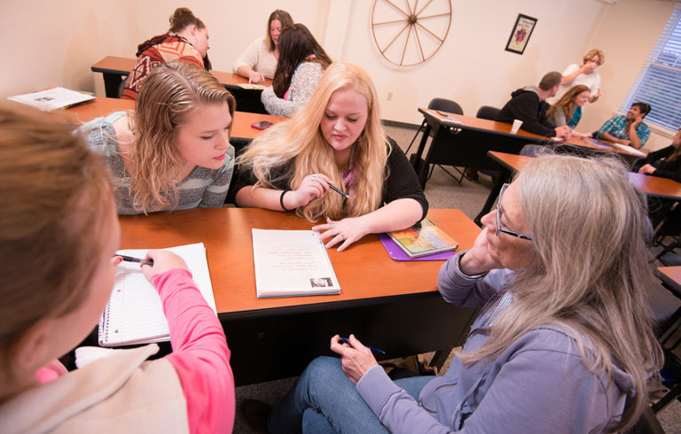 Students at Rockland's "URock" work with an instructor.