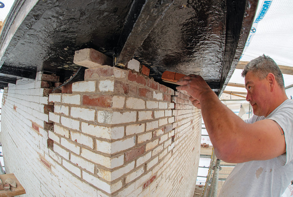 Joe Verzosa resets bricks.