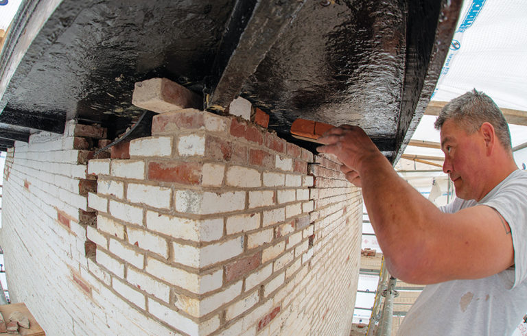 Joe Verzosa resets bricks.