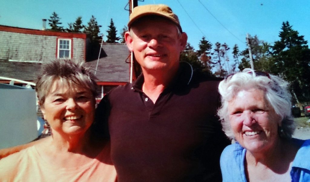 Actor Martin Clunes of the TV show Doc Martin is flanked by Mikki Ames