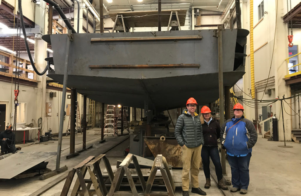 The Independence under construction at Washburn & Doughty Associates in East Boothbay. From left are the CTC's Matt Ridgway