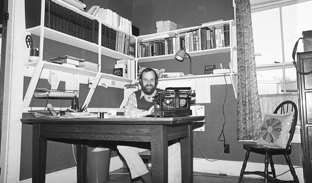 Island Ad-Vantages publisher and editor Nat Barrows at his typewriter in the early years.