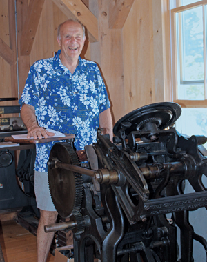 Barrows in a recent photo, demonstrating how the letter press worked.