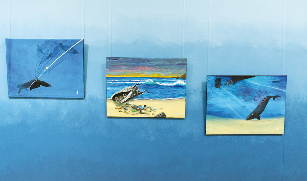 Nicholas Paul’s paintings depict how whales are killed.