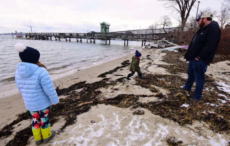 Tom Werner and his children on the Peaks Island shore