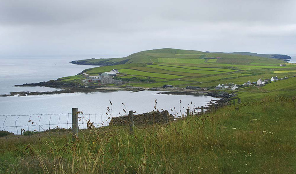 A scenic view of an island off Scotland.