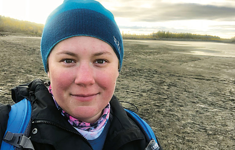 Jacquelyn Gill stands near the Indigirka River