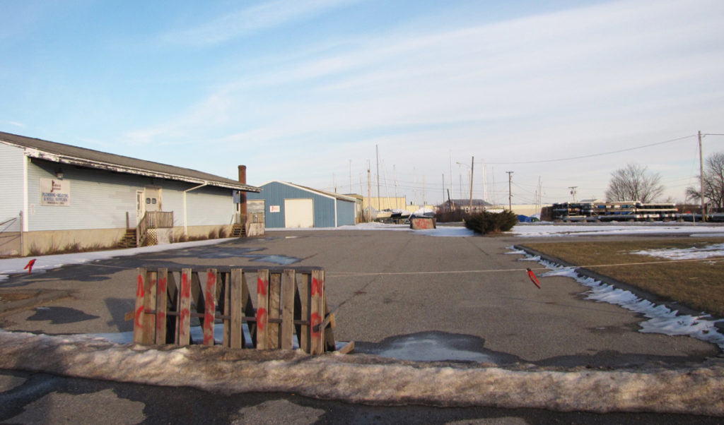 The site of a former plumbing supply house is vacant after the building sustained a fire. City officials are hoping to lure new investment in the area.