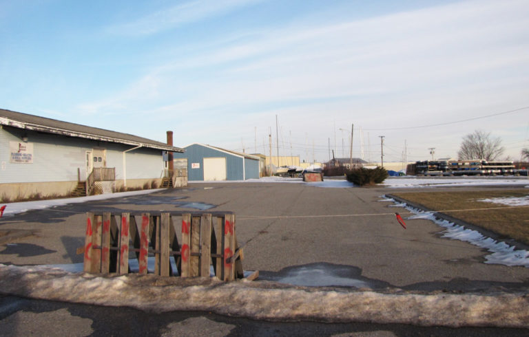 The site of a former plumbing supply house is vacant after the building sustained a fire. City officials are hoping to lure new investment in the area.