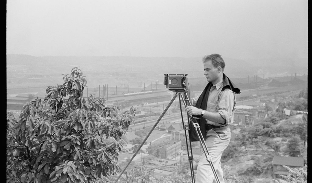 The young Arthur Rothstein sets up his camera.