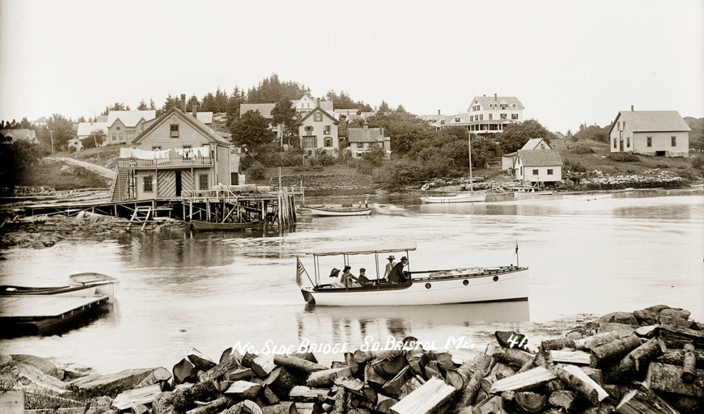 A schooner sails past the tanks in South Portland on a late May Saturday.