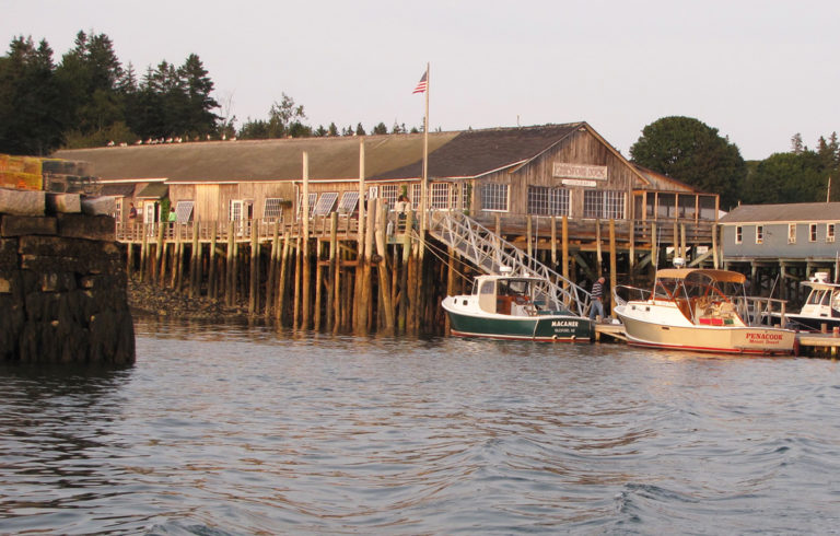 The Islesford Dock restaurant as seen from the water.