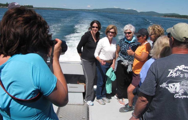 The boats to and from the Cranberry Isles are crowded in summer.