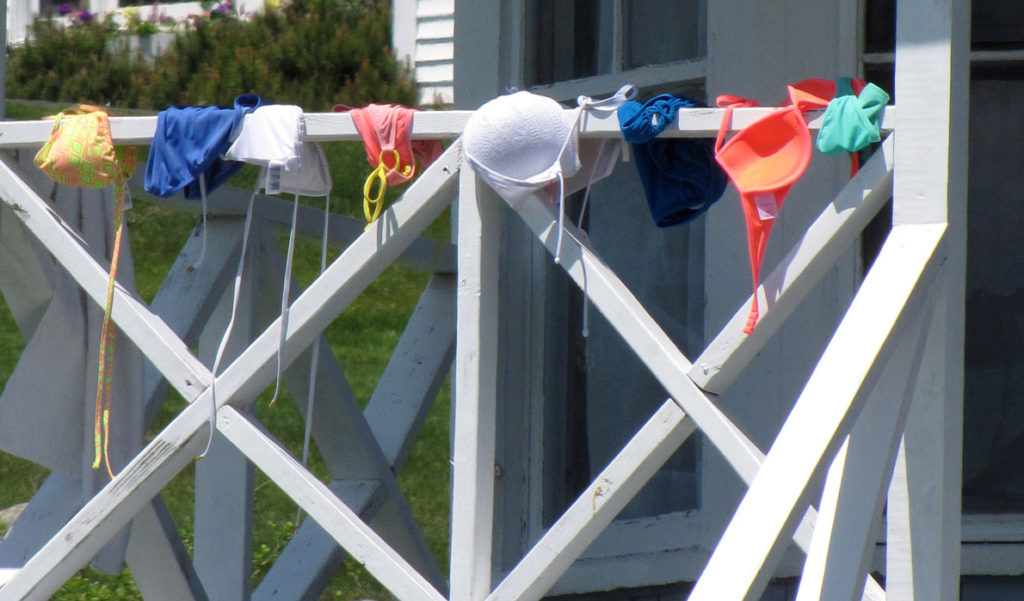 Bathing suits of the modest variety dry in the sun on Peaks Island.