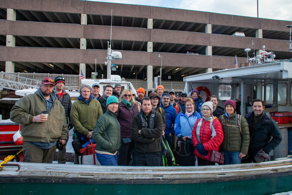 Participants in the Island Institute's Aquaculture Business Development (ABD) program join Institute staff and other guests on the boat prior to the start of the morning farm tours during the 2019 Industry Day event on December 5th in Portland.