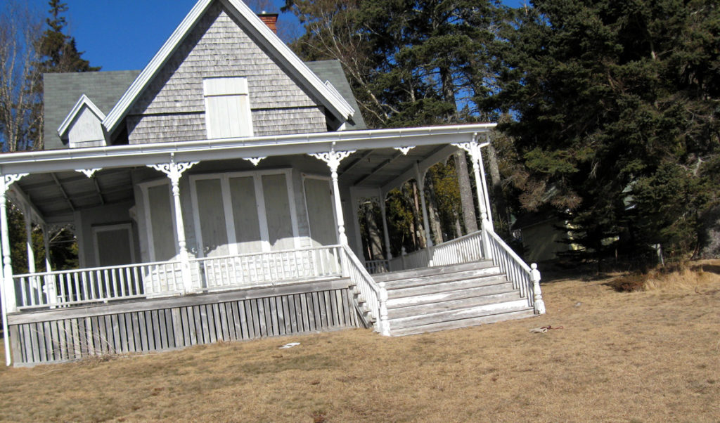 A house on Hancock Point boarded up for winter.