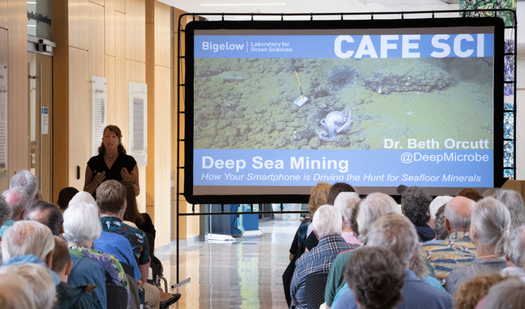 An audience of about 120 listens to Beth Orcutt at Bigelow Laboratories for Ocean Science in East Boothbay.