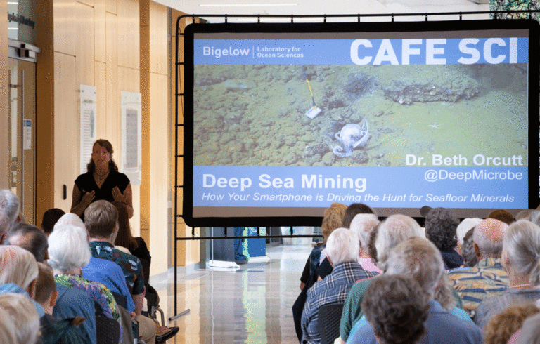 An audience of about 120 listens to Beth Orcutt at Bigelow Laboratories for Ocean Science in East Boothbay.