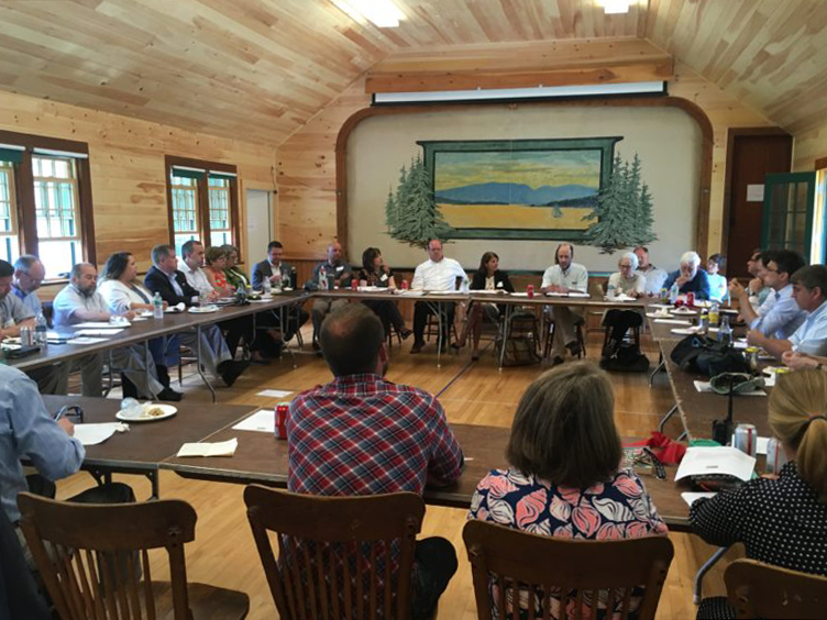 State and community leaders take part in a roundtable discussion on broadband in Maine following the ribbon cutting on the Cranberry Isles in July.