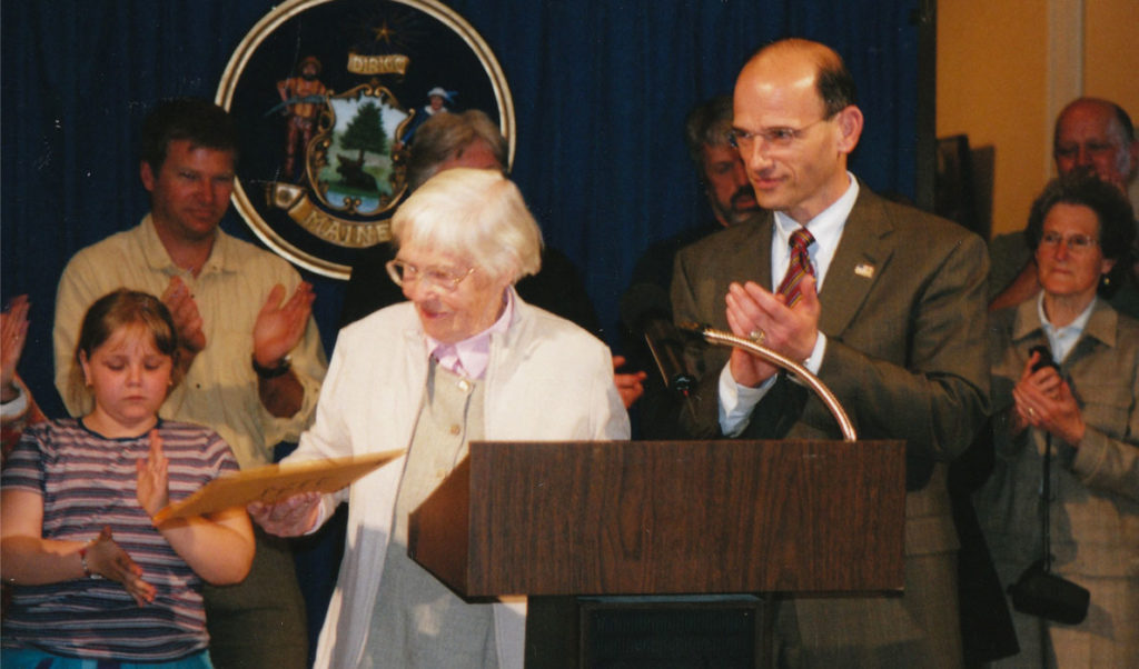 Mabel Knowles Doughty with Gov. John Baldacci when the bill creating the town of Chebeague Island was signed.