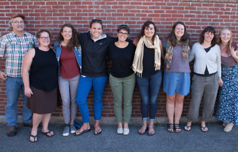 The 2017-18 Island Fellows. Pictured left to right: Ken Gross (Millinocket); Dana Mark (Deer Isle-Stonington); Maria Keeler (North Haven); Tarah Waters (Eastport); Stefanie Kowalczyk (Swan’s Island); Maddy Bruno (Islesboro); Meredith Ballinger (St. George); Hillary Savage (Vinalhaven); and Stefanie Burchill (Beaver Island