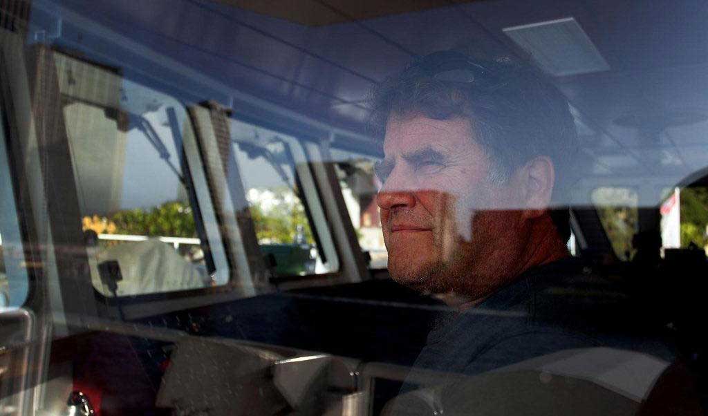 Peter Willcox in the wheelhouse of a Greenpeace ship.
