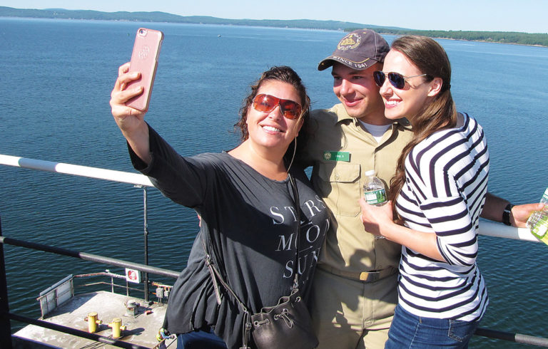 Rylee Knox of Turner poses for a “selfie” with his mother