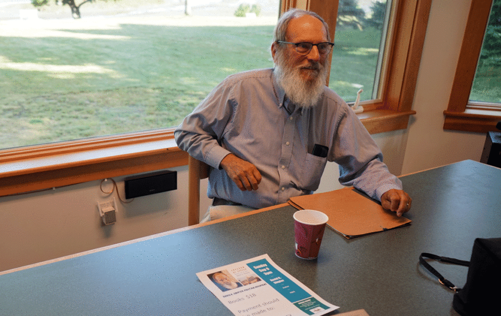 David Shipler prepares to sign copies of his books after speaking at Prospect Harbor’s Dorcas Library on Sept. 9.
