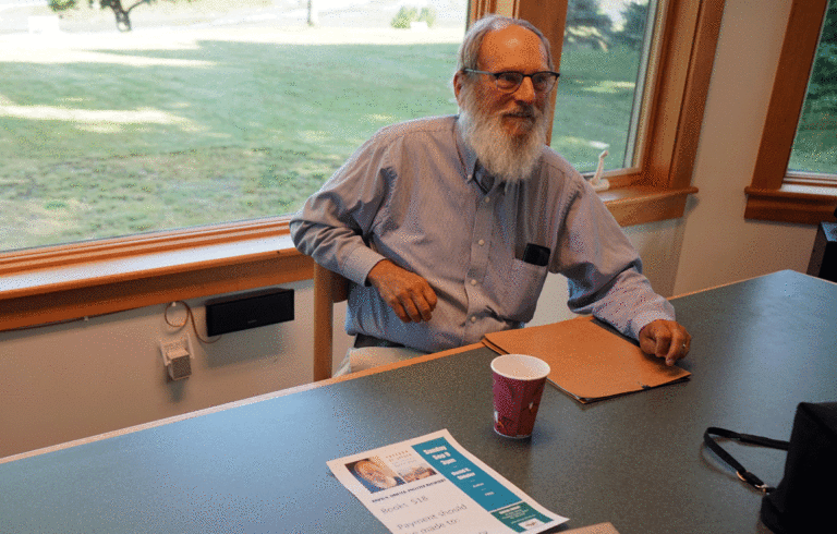 David Shipler prepares to sign copies of his books after speaking at Prospect Harbor’s Dorcas Library on Sept. 9.