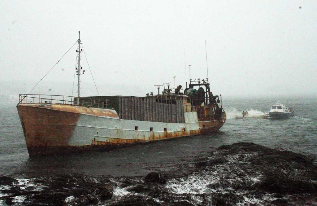 The fishing vessel Westward being towed off a ledge by Fuller Marine Services in  Boothbay Harbor on Jan. 9.