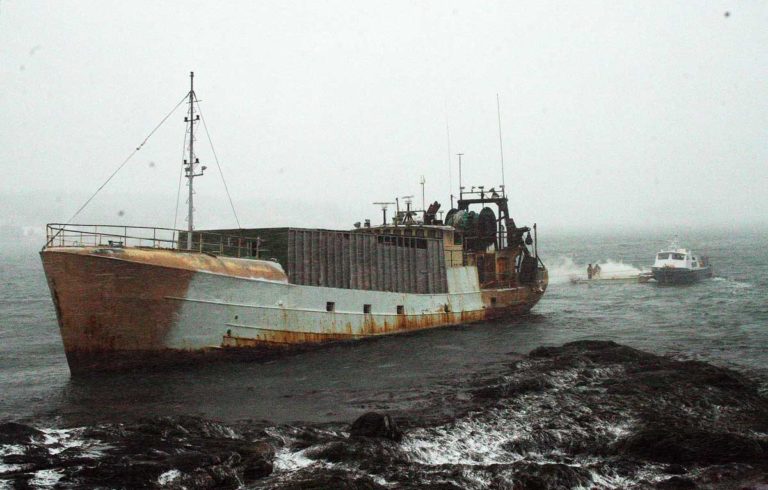 The fishing vessel Westward being towed off a ledge by Fuller Marine Services in  Boothbay Harbor on Jan. 9.