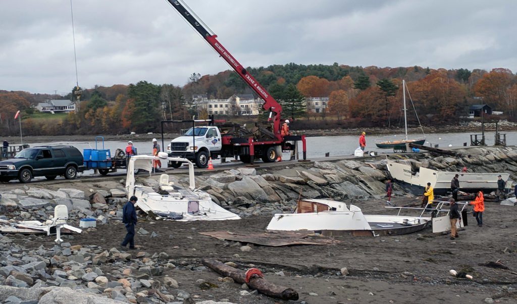 The remnants of boats destroyed during the Oct. 30 storm washed ashore near Belfast's breakwater.