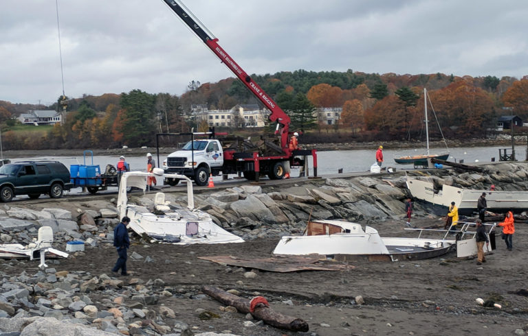 The remnants of boats destroyed during the Oct. 30 storm washed ashore near Belfast's breakwater.