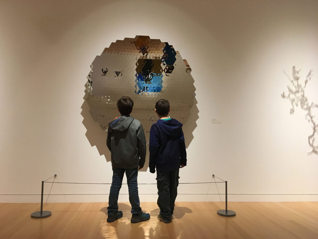 TLC students check out one of the pieces inside the art museum at Colby College during the spring TLC field trip.