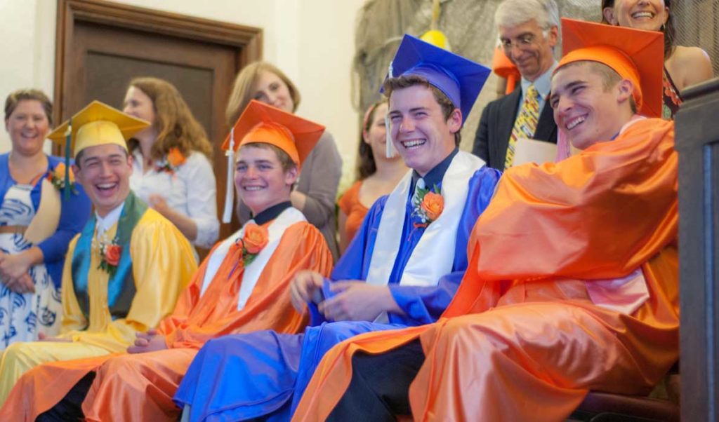 High school graduation on North Haven in 2014. The grads wore the colors that corresponded to the colors of their lobster buoys.
