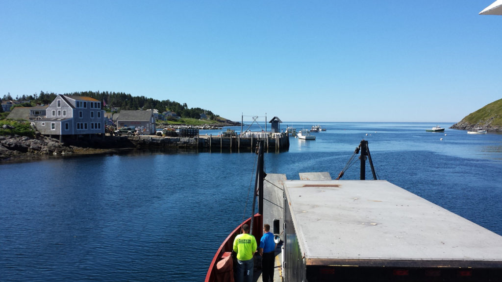 Spray Foam truck on a barge approaching Monhegan Island