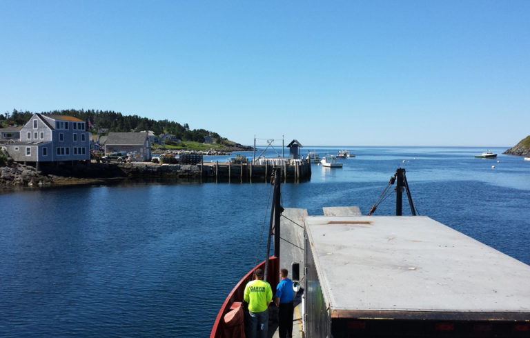 Spray Foam truck on a barge approaching Monhegan Island