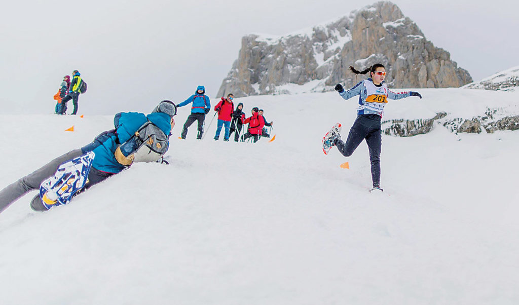 Rogers competing at snowshoe running.