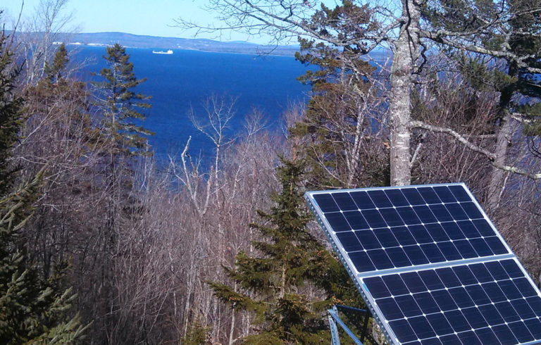 A photovoltaic panel in a yard on Islesboro.