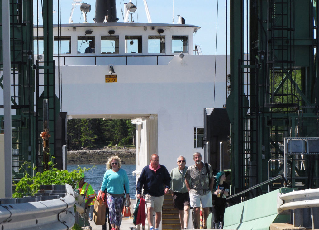 People getting off of the ferry on Islesboro.