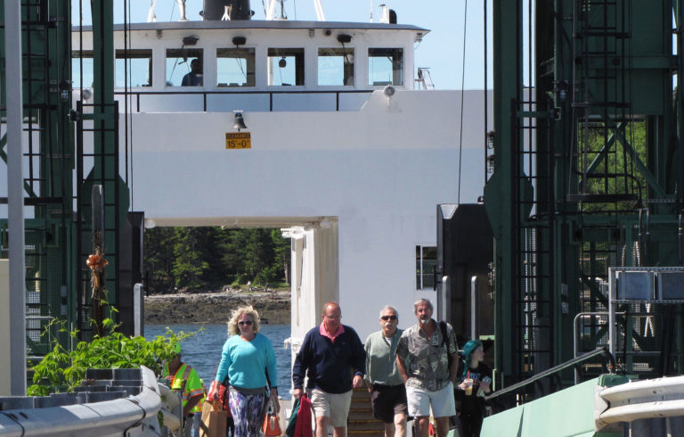 People getting off of the ferry on Islesboro.