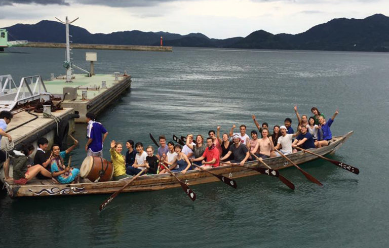 The HELIO group tries rowing a local "dragon" boat.
