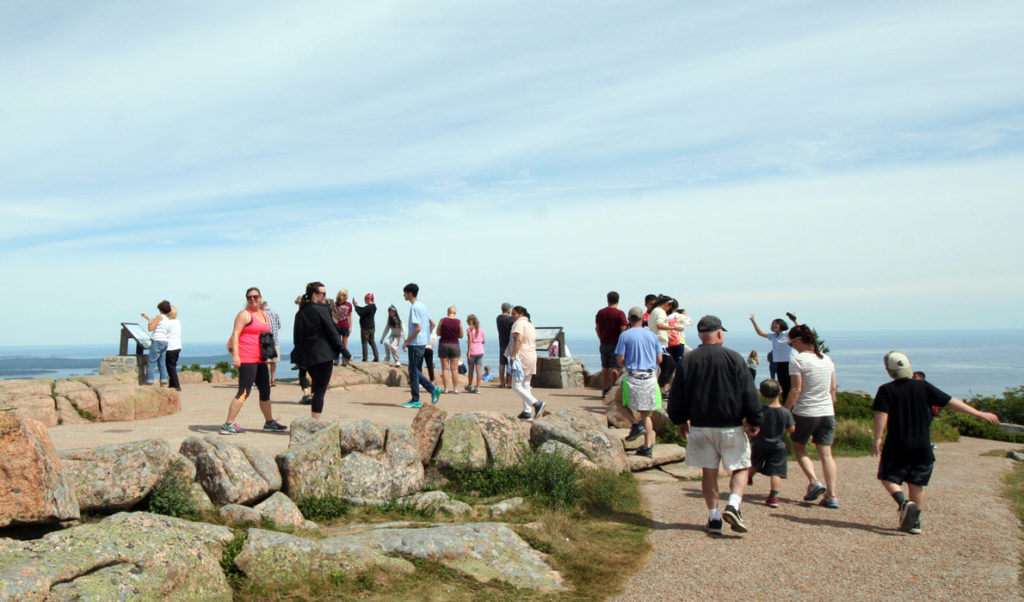 Visitors flock to the top of Cadillac Mountain in Acadia National Park