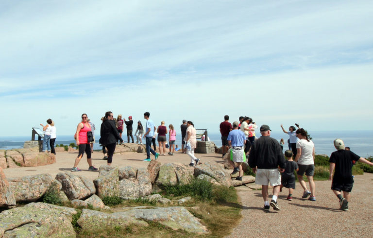 Visitors flock to the top of Cadillac Mountain in Acadia National Park
