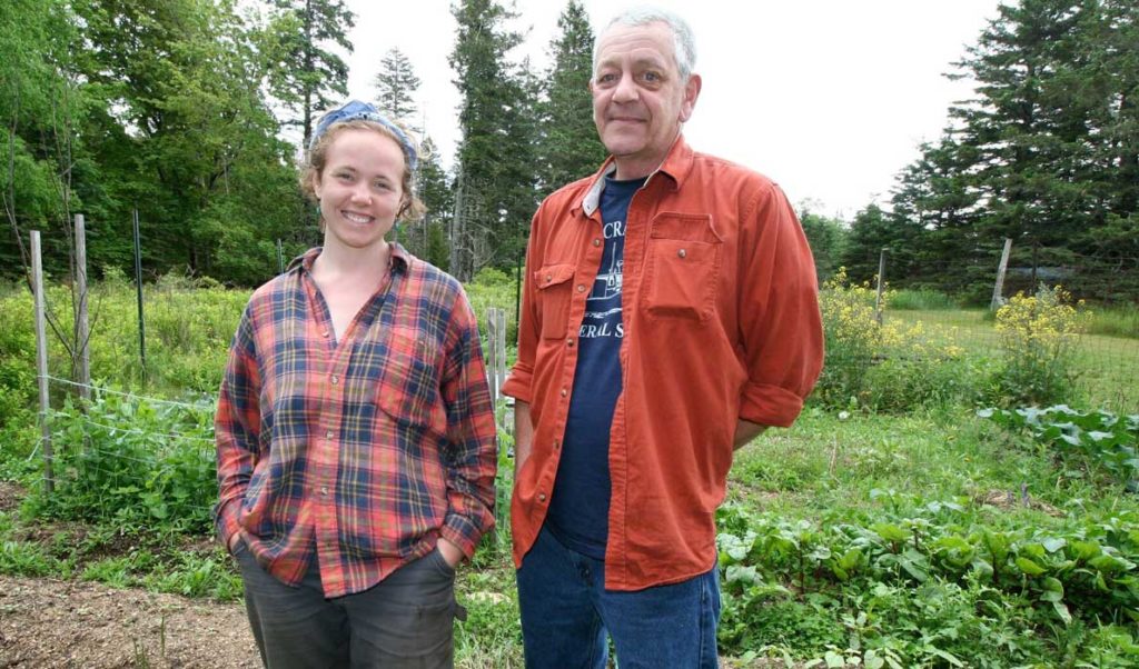 Landowner Mark Alley and Island Institute Fellow Jessi Duma at the garden Alley is allowing Duma and her colleagues to bring back after a long period of lying fallow.