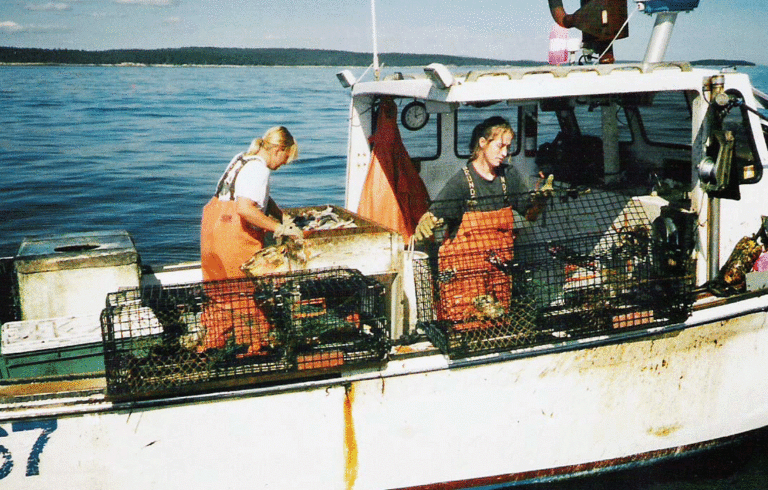 Sisters Betsy and Jill Philbrook fish from their boat off Swan's Island. Betsy first fished with her grandmother