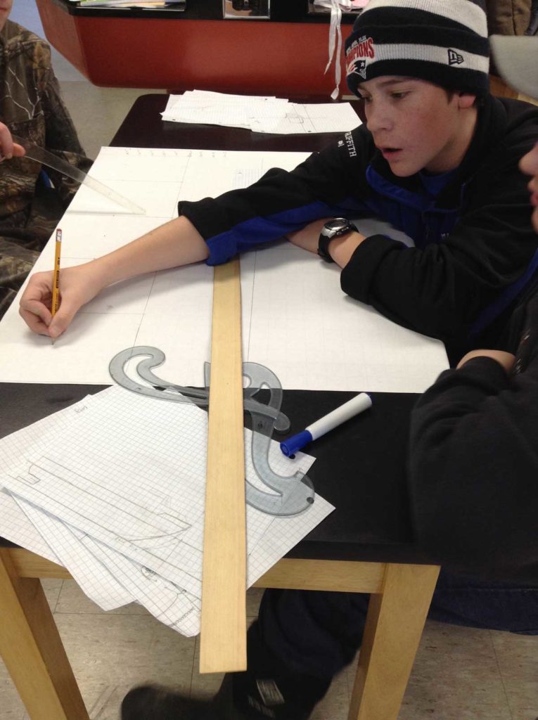 Students at Deer Isle-Stonington High School design lobster boats.