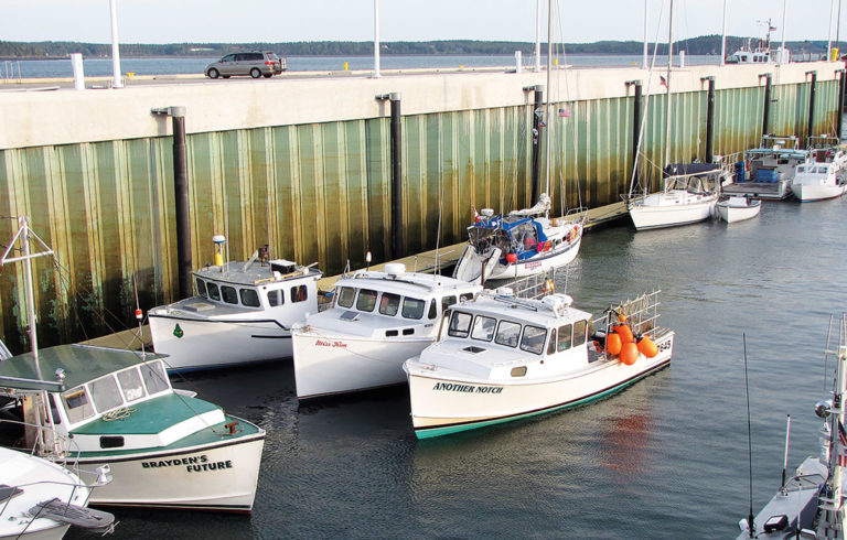 Eastport's rebuild breakwater shelters fishing boats.